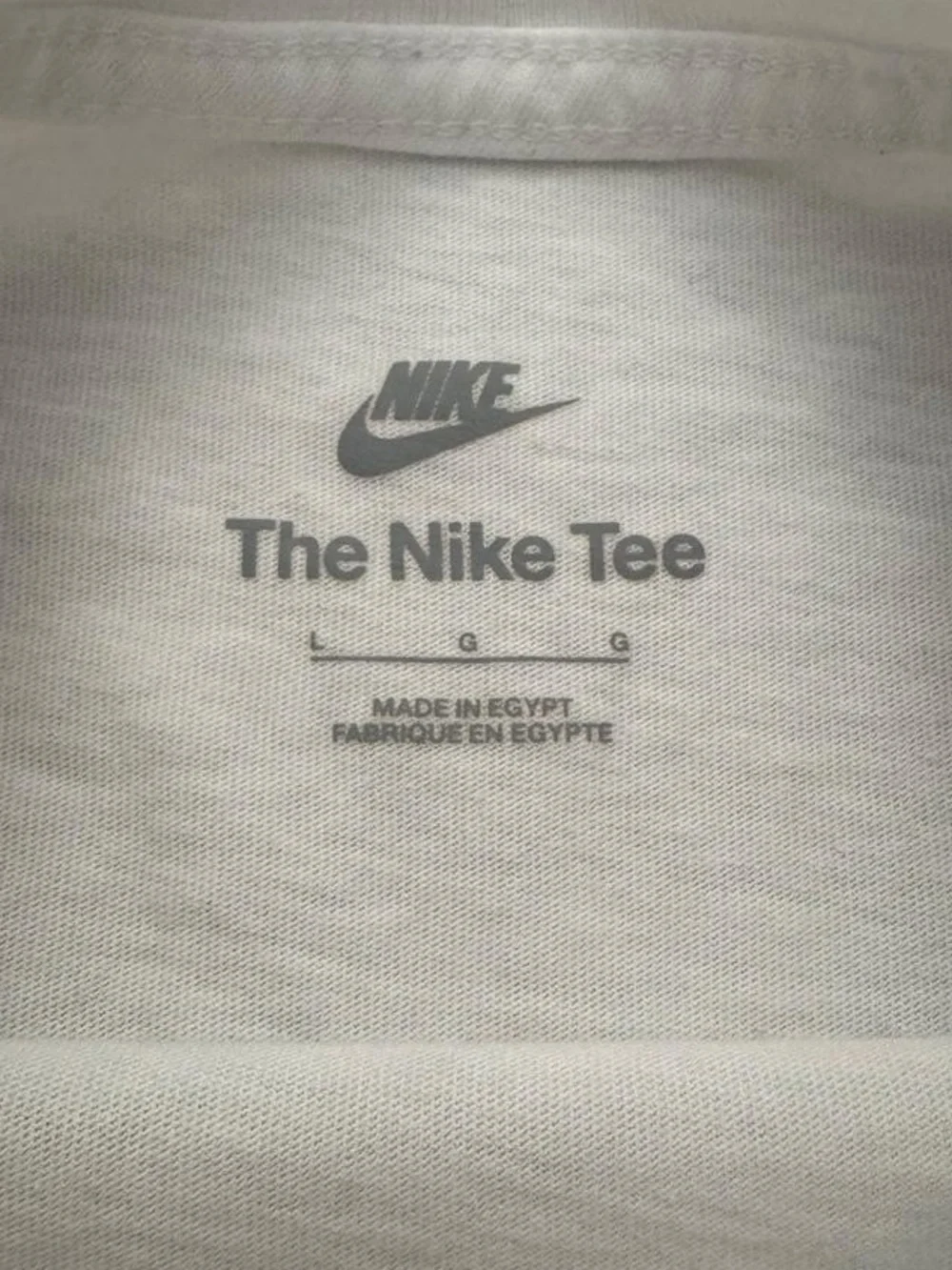 Nike Kids White Tee with Green Fair Isle Chest Stripe and Red Swoosh